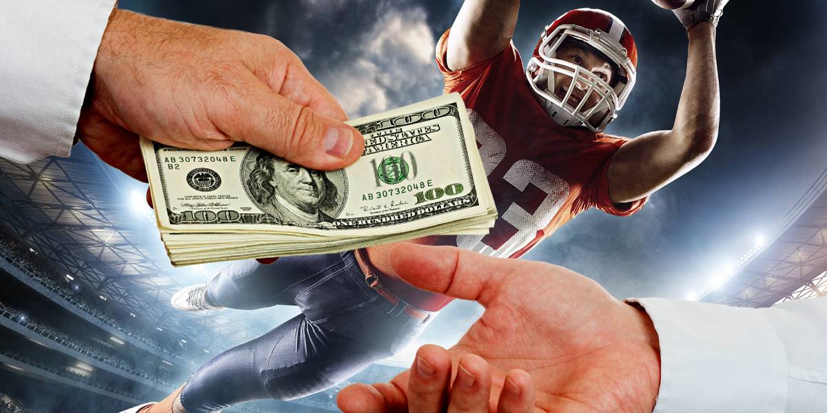 Football player making a high catch while money is exchanged in the foreground, highlighting sports betting.