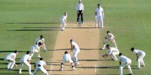 Slip fielders close in on batsman during intense cricket session, ideal for odd boost strategies