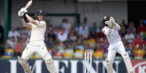 English batsman plays attacking shot as Sri Lankan wicketkeeper reacts, ideal for analysing cricket stat trends